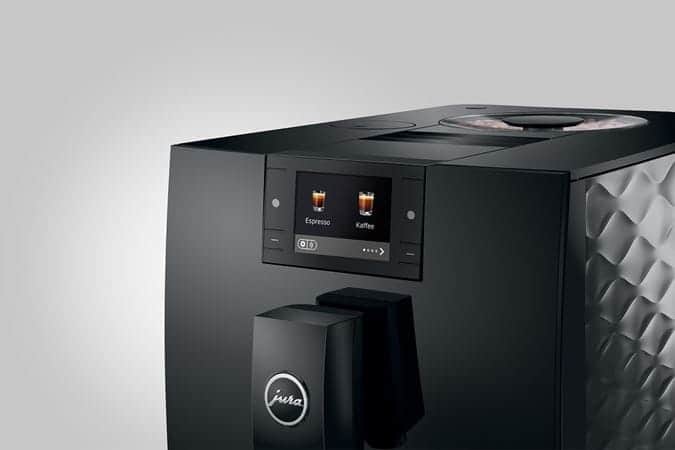 High-end Jura koffieautomaat met digitaal bedieningspaneel en diverse koffieopties, perfect voor zakelijke en thuisgebruik.