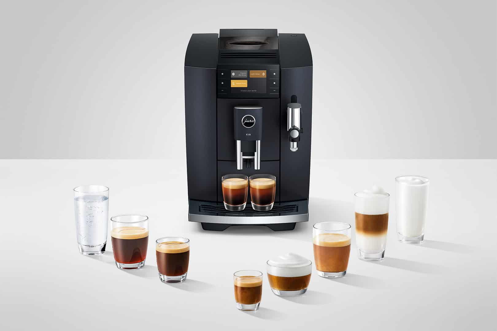 Elegante koffiezetapparaat met verschillende koffiegenotjes, inclusief espresso, cappuccino en latte macchiato, geschikt voor thuisgebruik of horeca.